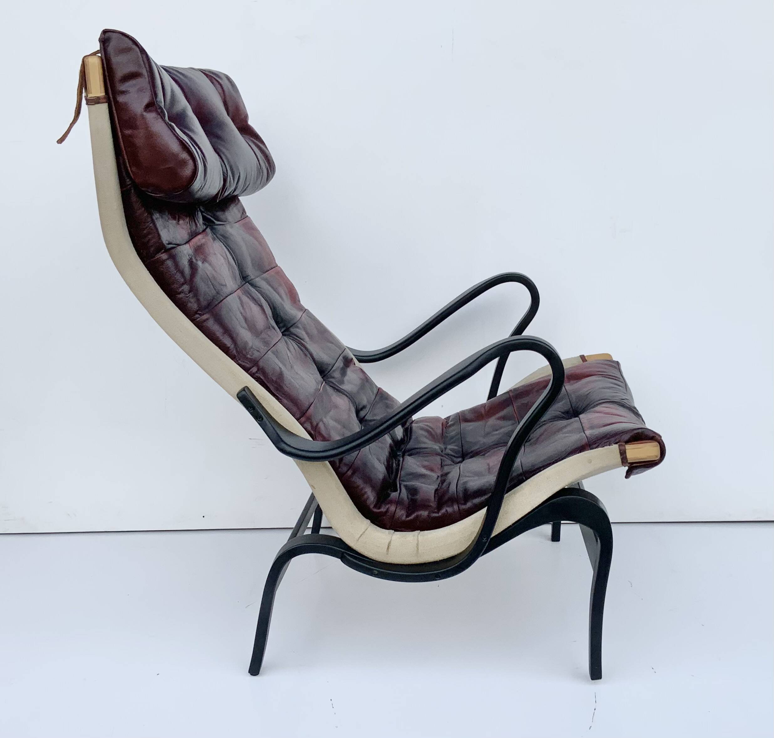 Vintage Pernilla 69 Armchair by Bruno Mathsson for Dux In Oxblood Leather