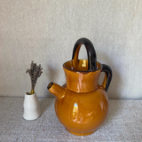 Enameled jugs signed Gomares