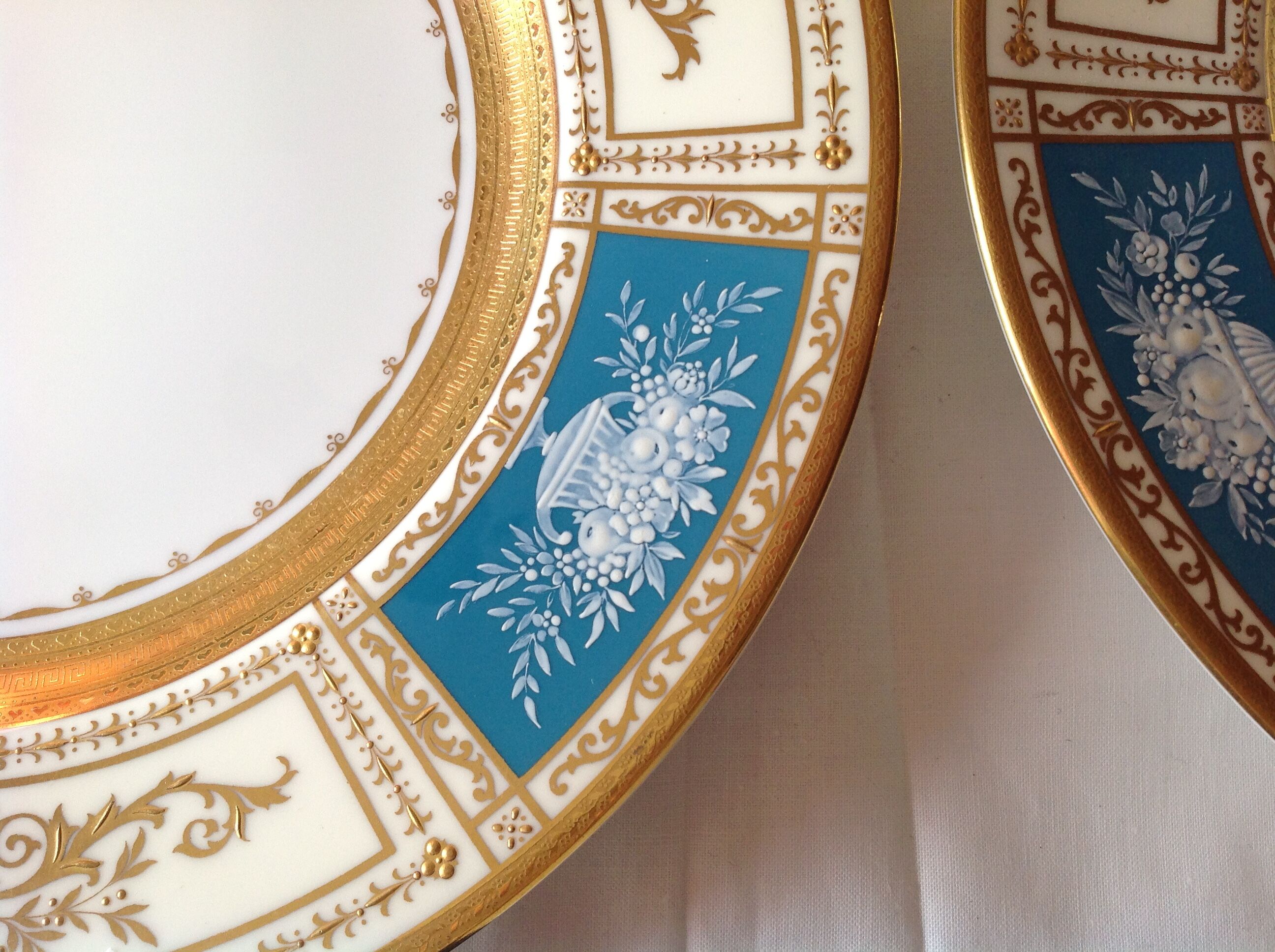 4 fine porcelain flat plates