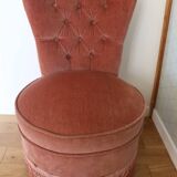 Powder pink fireside chair with fringes