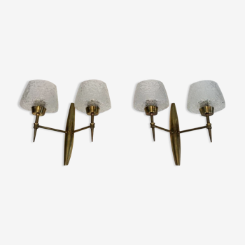 Pair of bronze sconces with worked glass reflectors