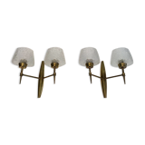 Pair of bronze sconces with worked glass reflectors