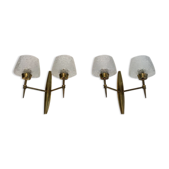 Pair of bronze sconces with worked glass reflectors