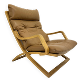 Vintage lounge chair cognac leather with webbing, 1970s