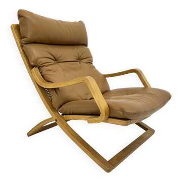 Vintage lounge chair cognac leather with webbing, 1970s