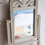 Small antique folding wooden dressing table with tiles and a mercury mirror.