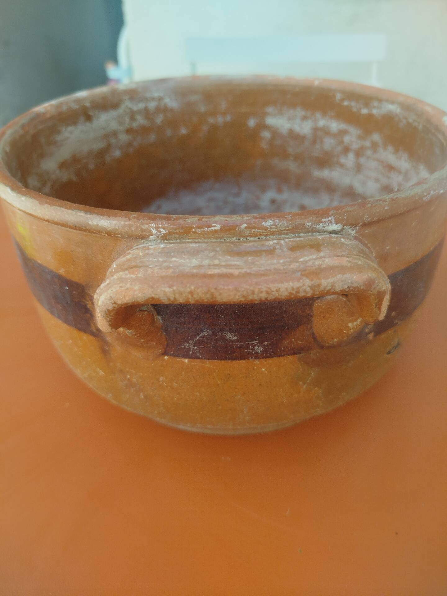 Old terracotta casserole