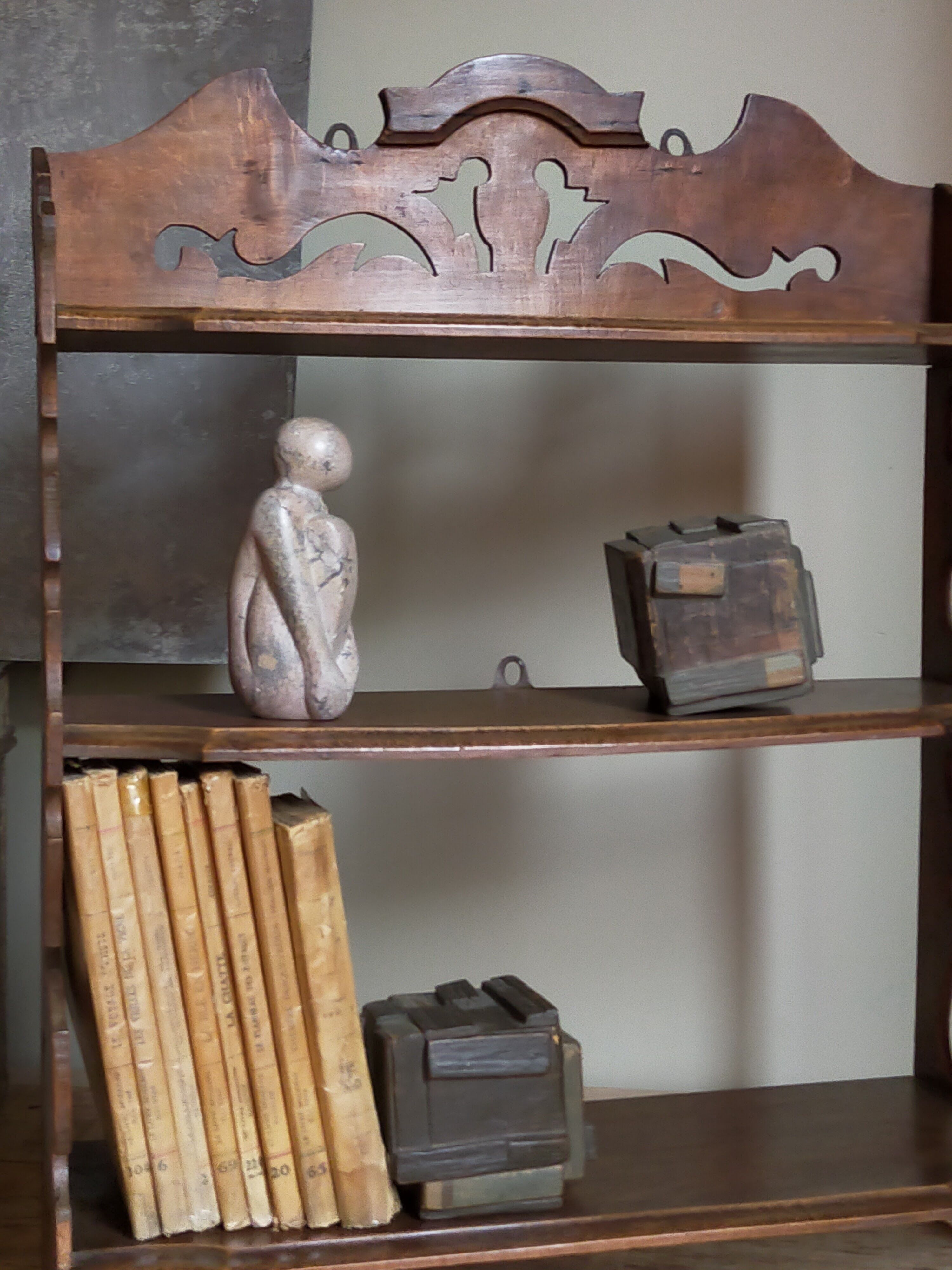 Old carved wooden wall shelf