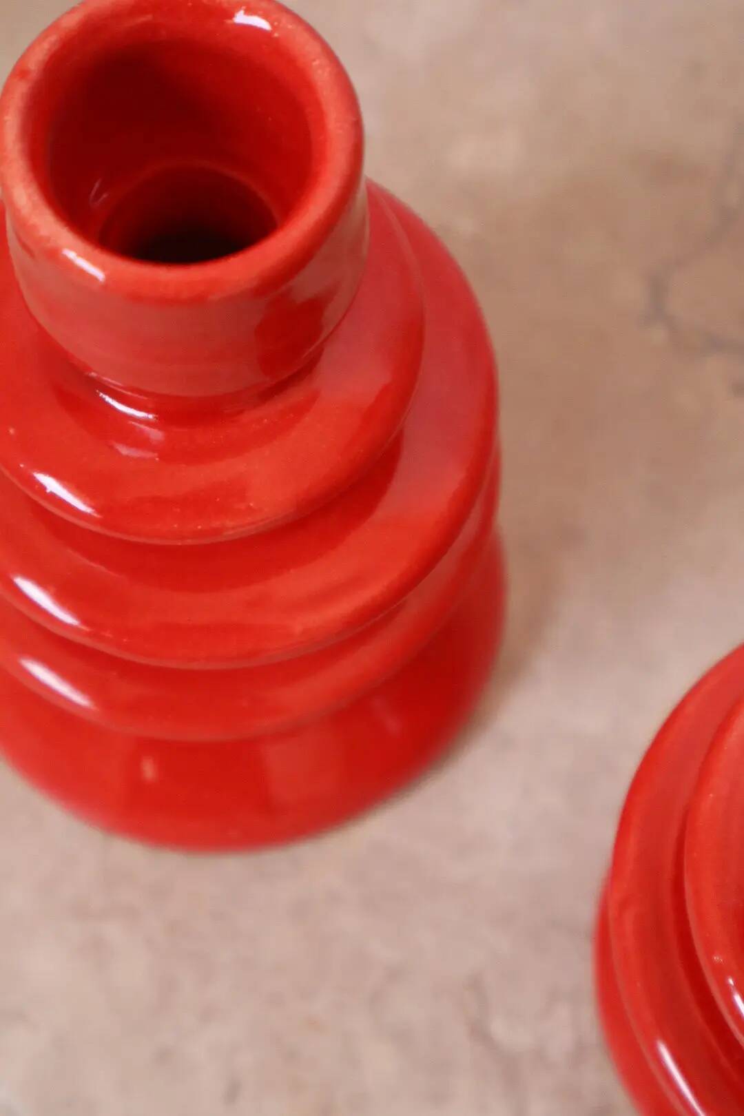 Pair of colorful poppy red ceramic candle holders