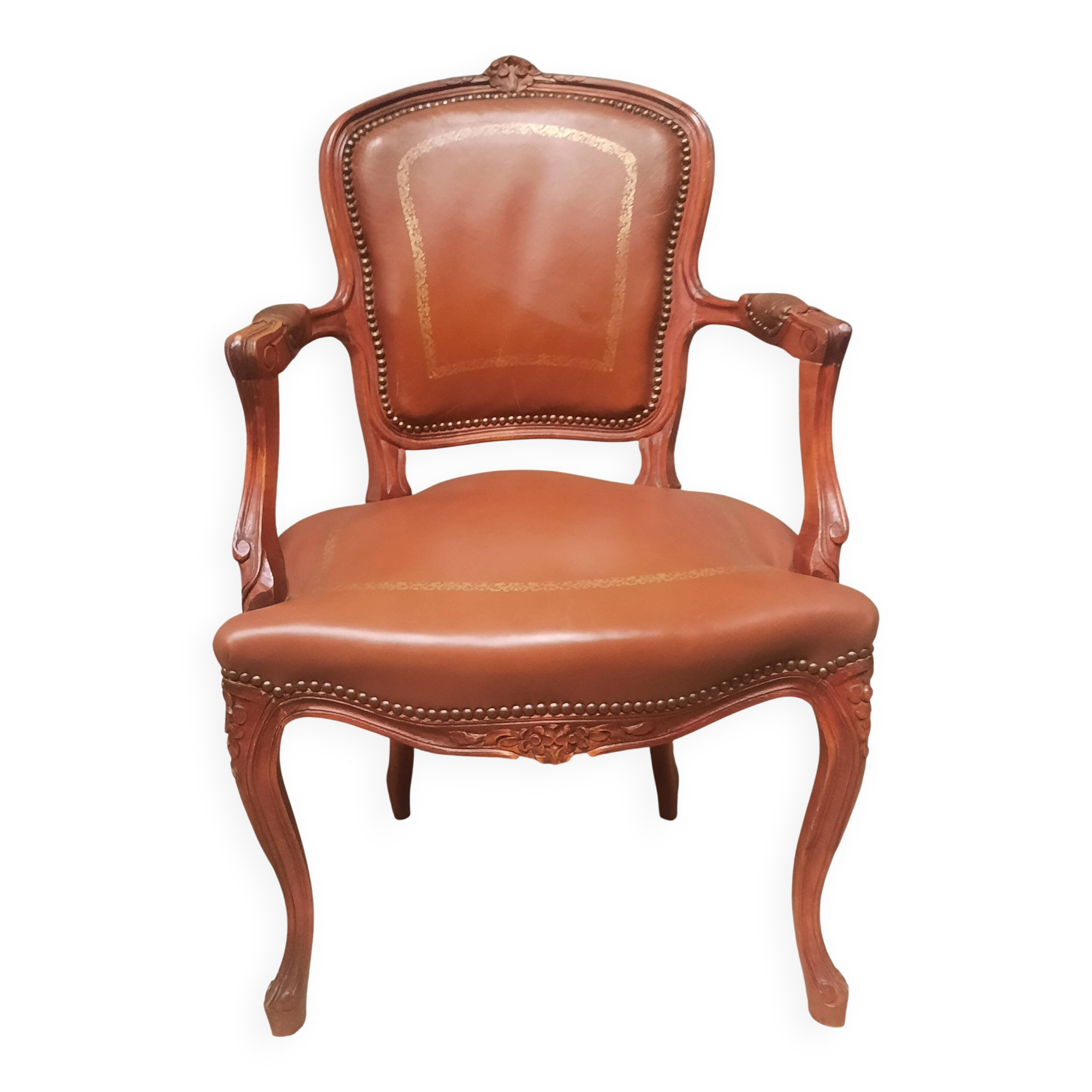 Louis XV style armchair covered in leather.