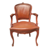 Fauteuil style Louis XV  recouvert de cuir