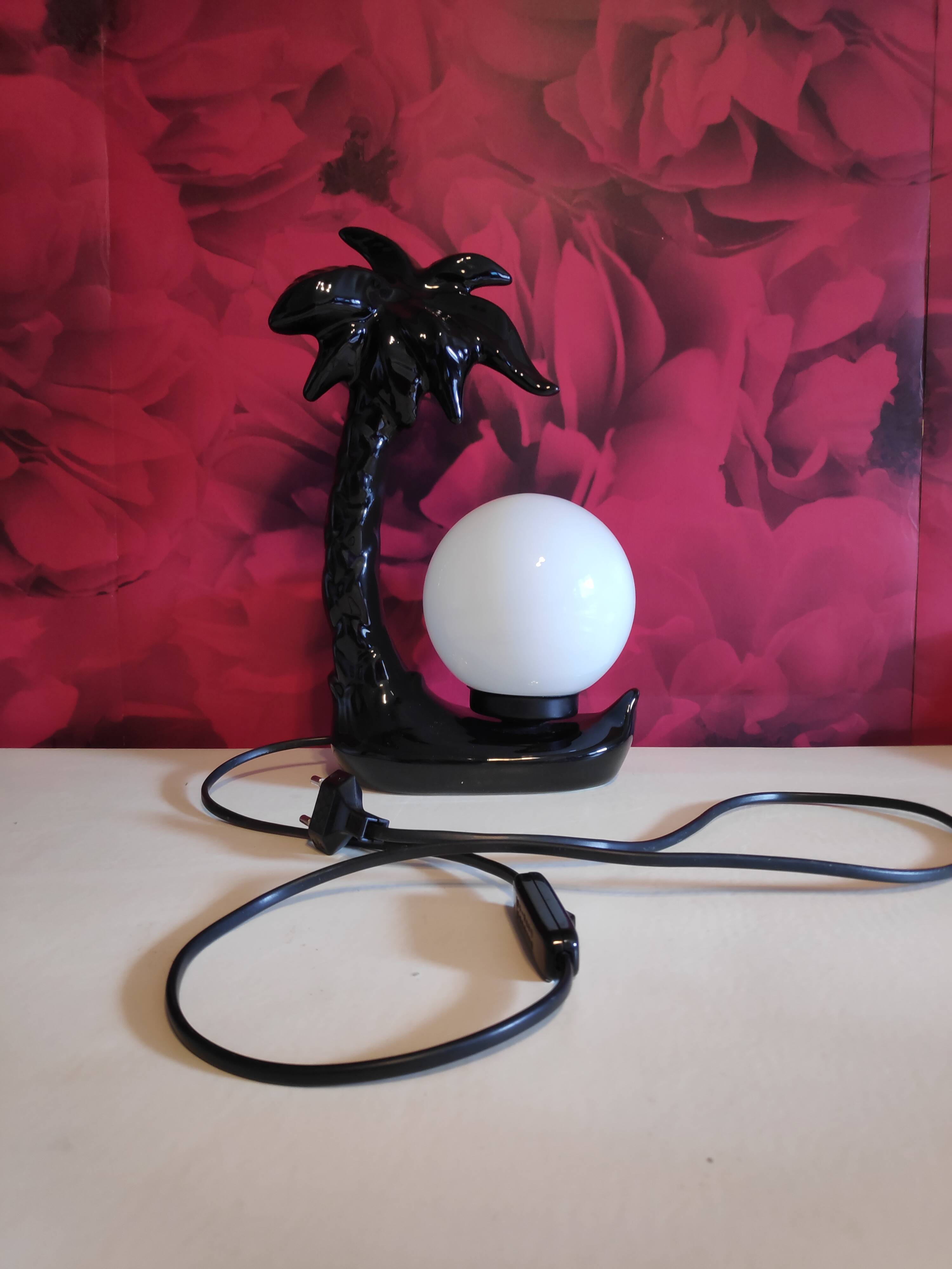 Black ceramic palm lamp and white opaline globe