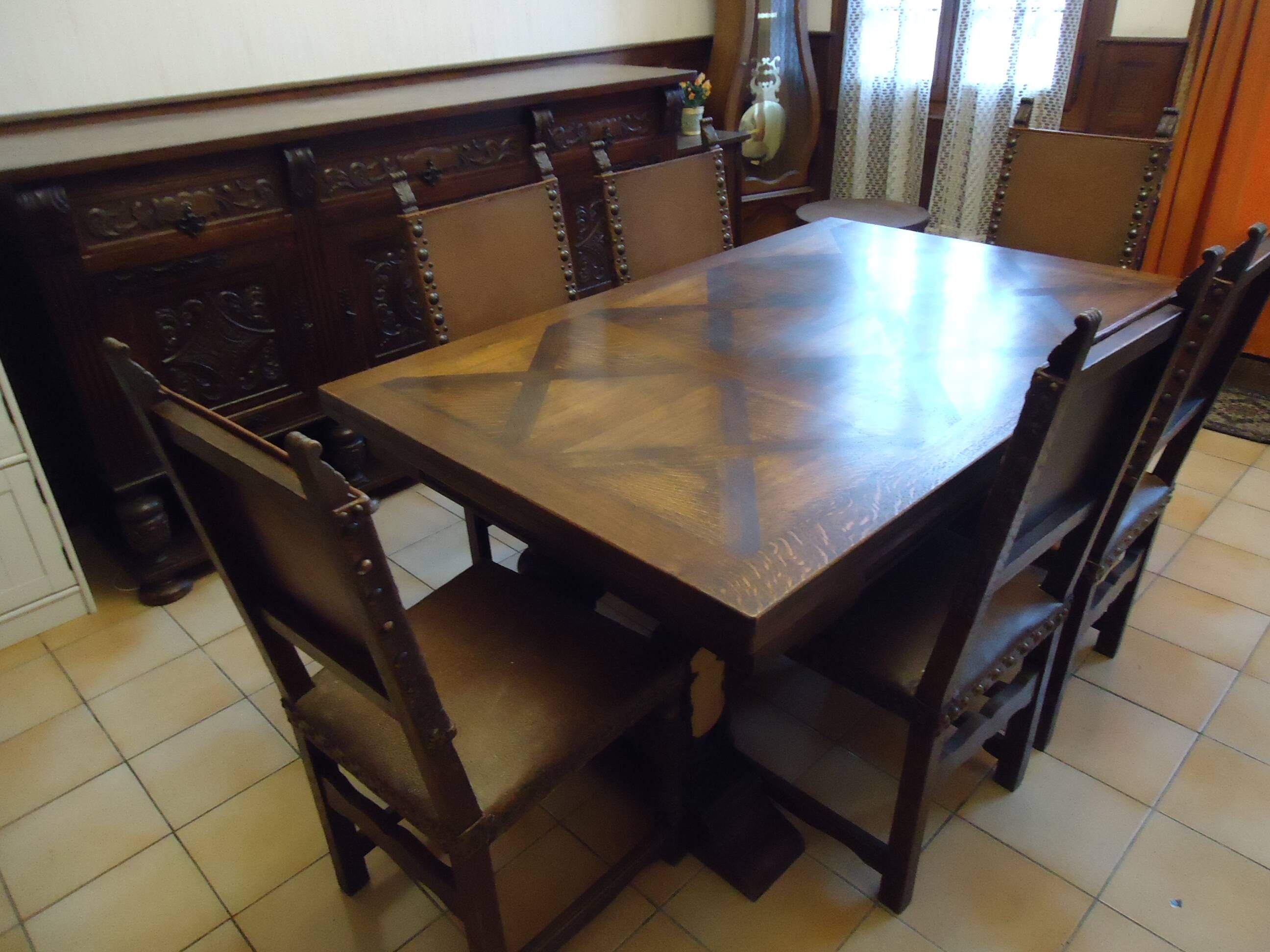 Dining table and 6 solid wood chairs from the 1950s.