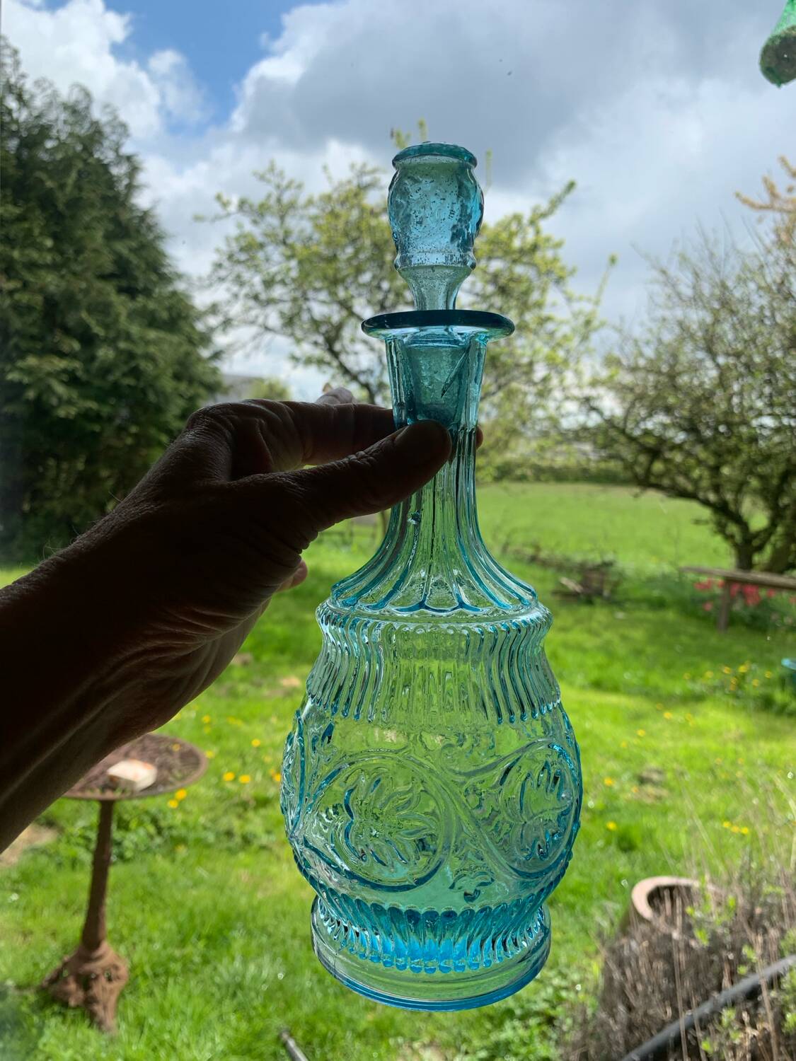 Old turquoise blue molded glass carafe