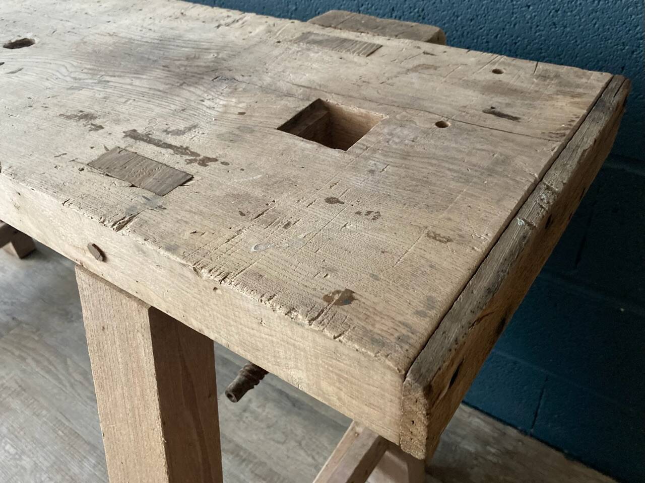 Old workbench with inclined legs