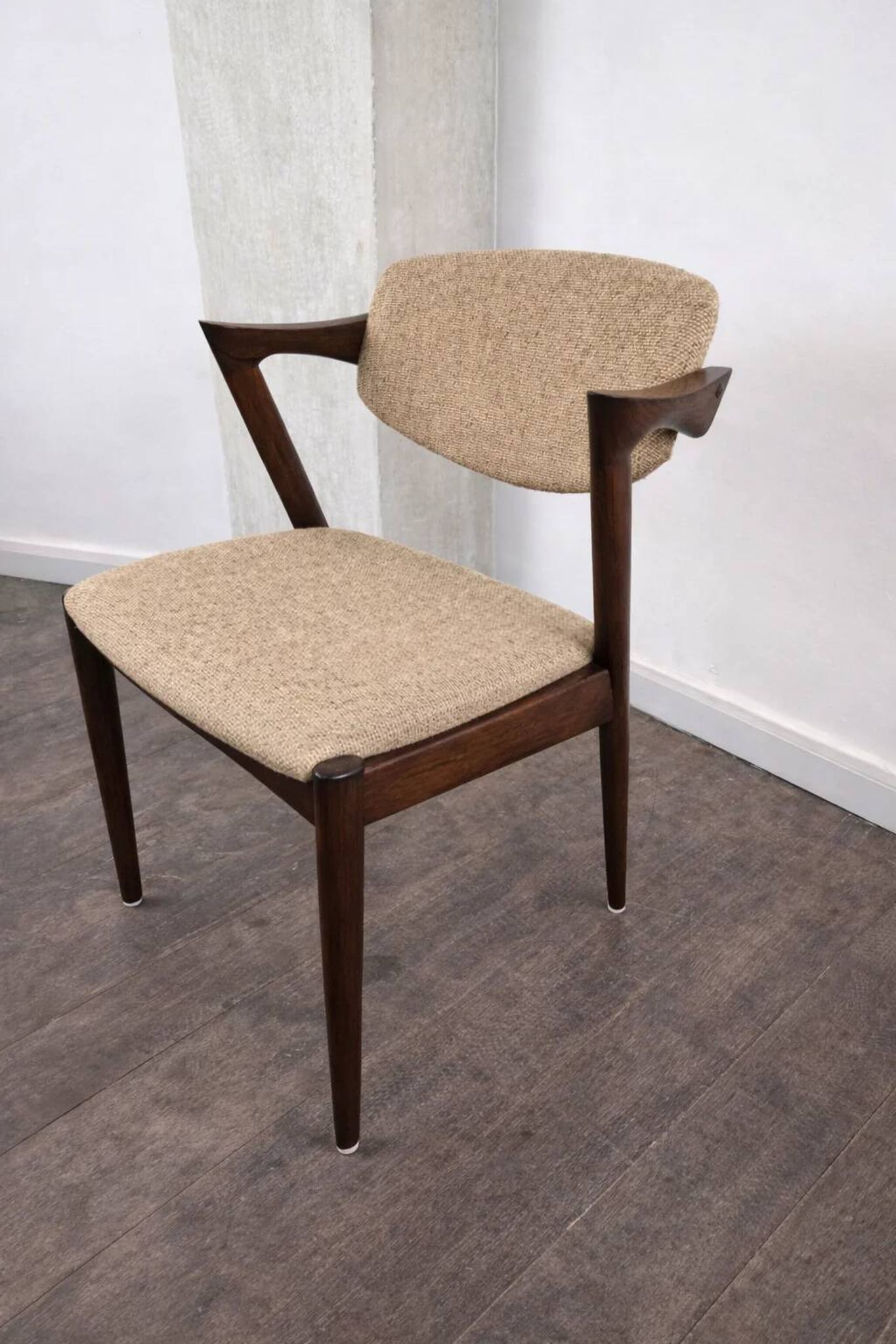 Rosewood and wool chair, model 42 by Kai Kristiansen for Korup Stolefabrik, Denmark, 1956.