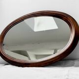 Miroir ancien ovale en bois sculpté – Teinte acajou
