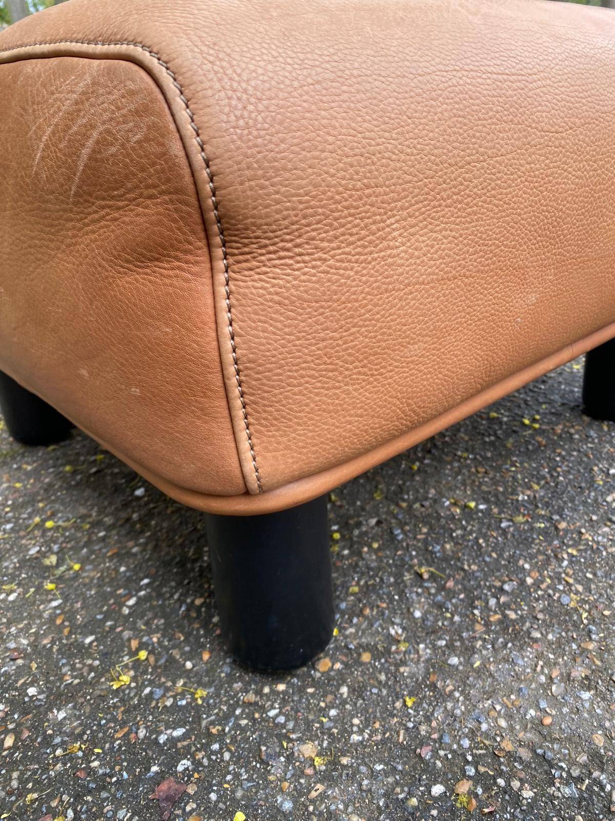 Scandinavian pouf design in brown leather, made in Switzerland by De Sede.
