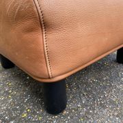 Scandinavian pouf design in brown leather, made in Switzerland by De Sede.