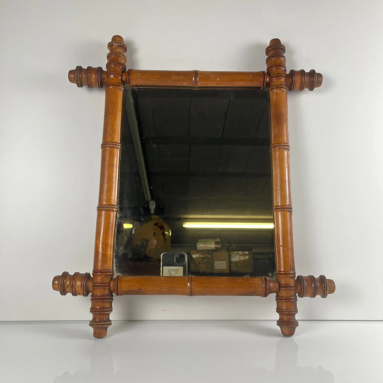 Wooden turned mirror in bamboo style, circa 1900-1930.