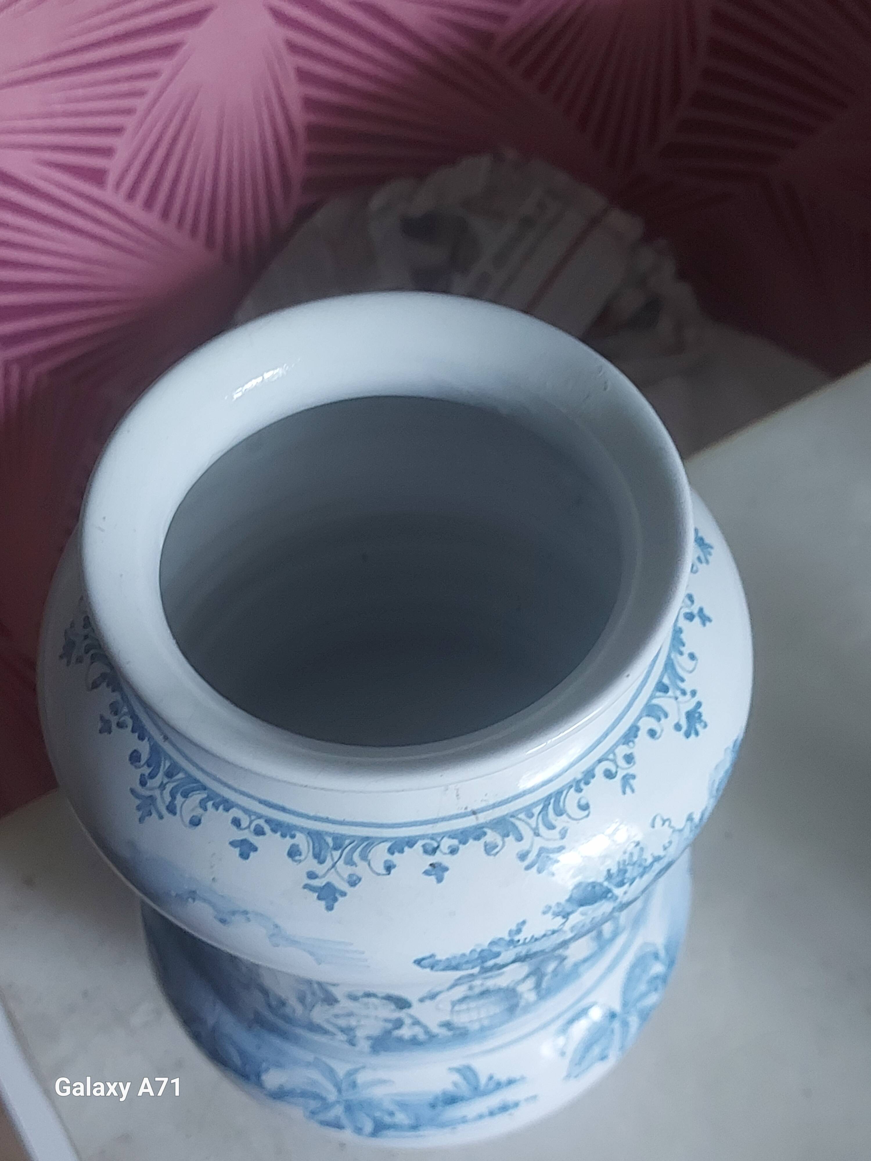 Moustier vase signed