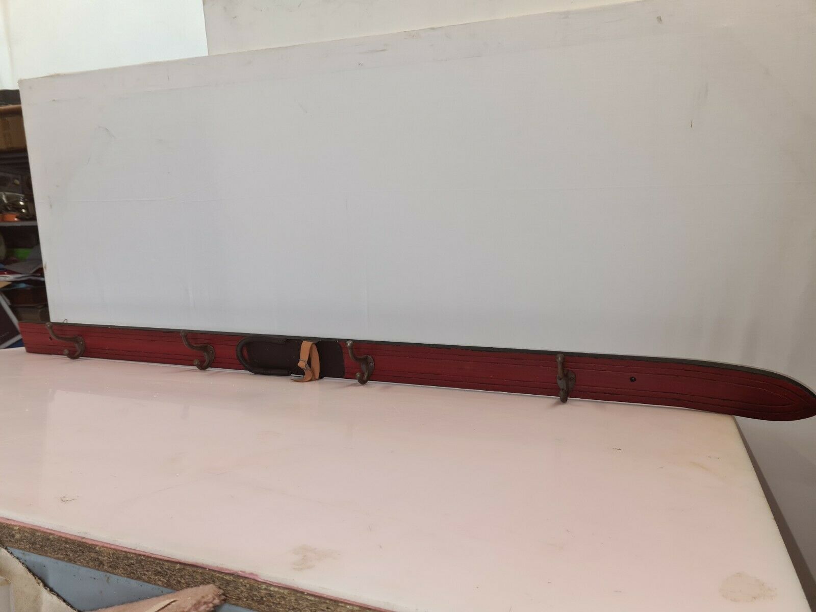 Wooden coat rack and cast iron hooks