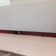 Wooden coat rack and cast iron hooks