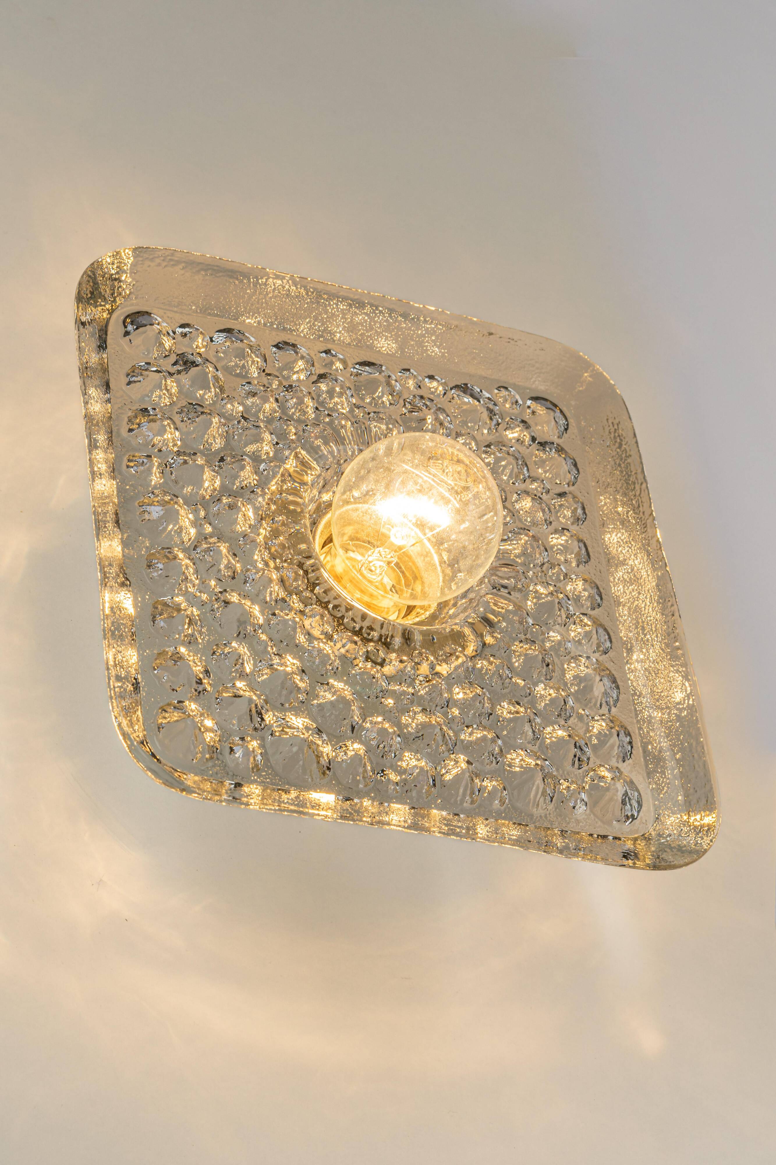 Exclusive Sputnik wall sconces in crystal by Peill & Putzler, Germany.