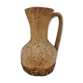 Terracotta jug covered with cork