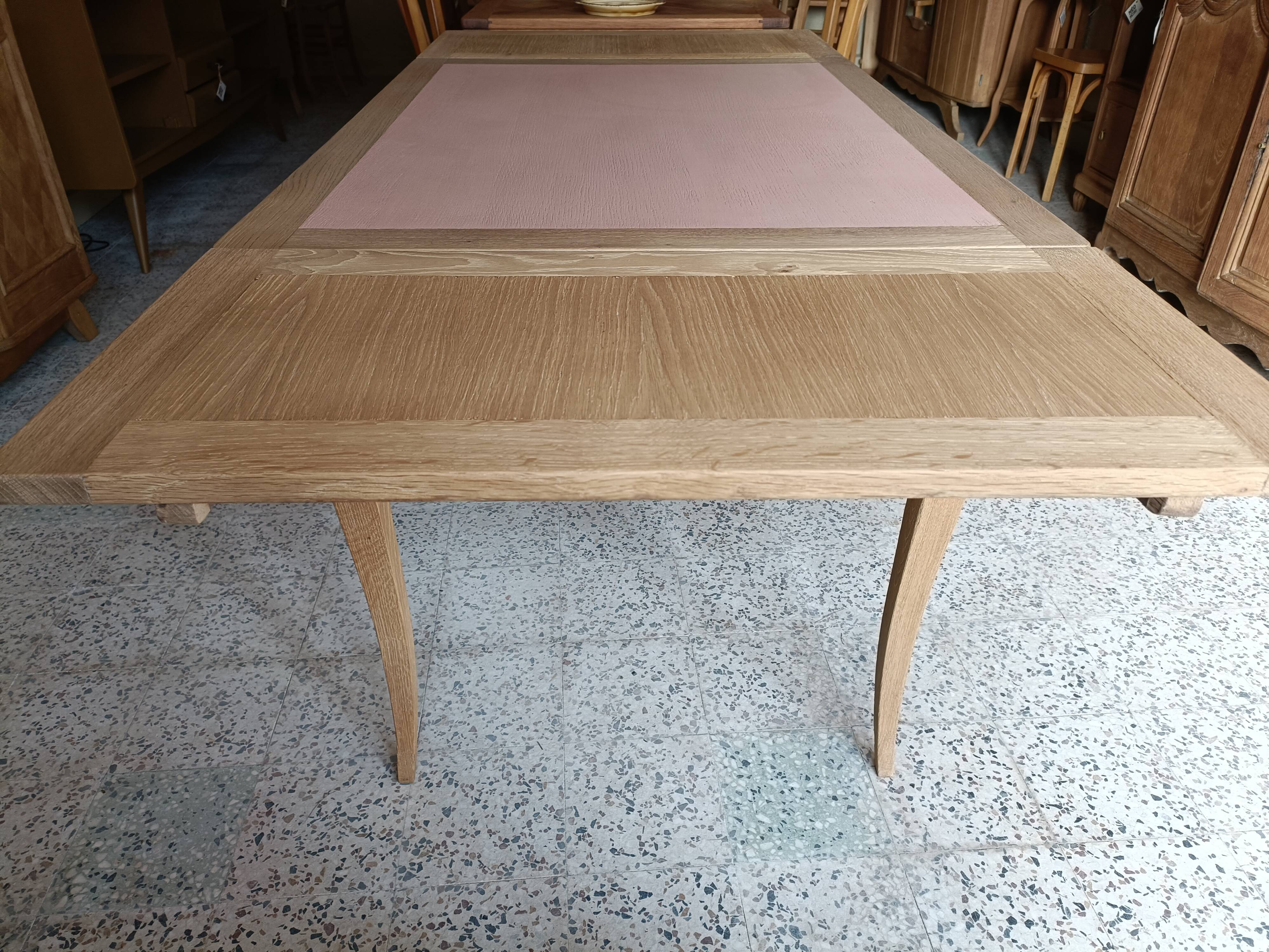 Table avec rallonges intégrées rénovée