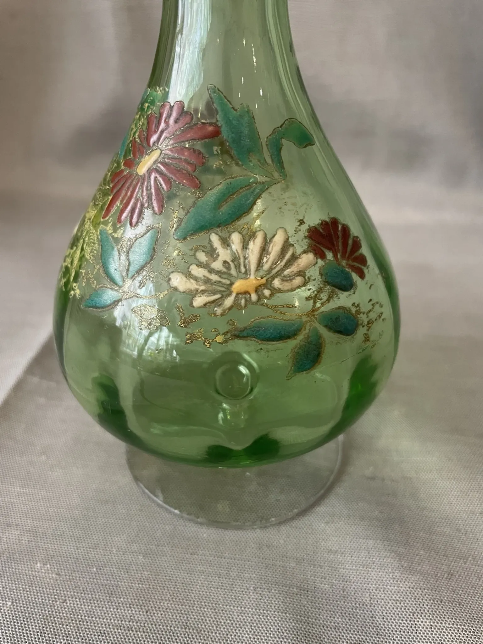 Liqueur carafe in ouraline with floral enamel decoration.