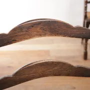 Pair of English oak armchairs with ladder back and rush seats