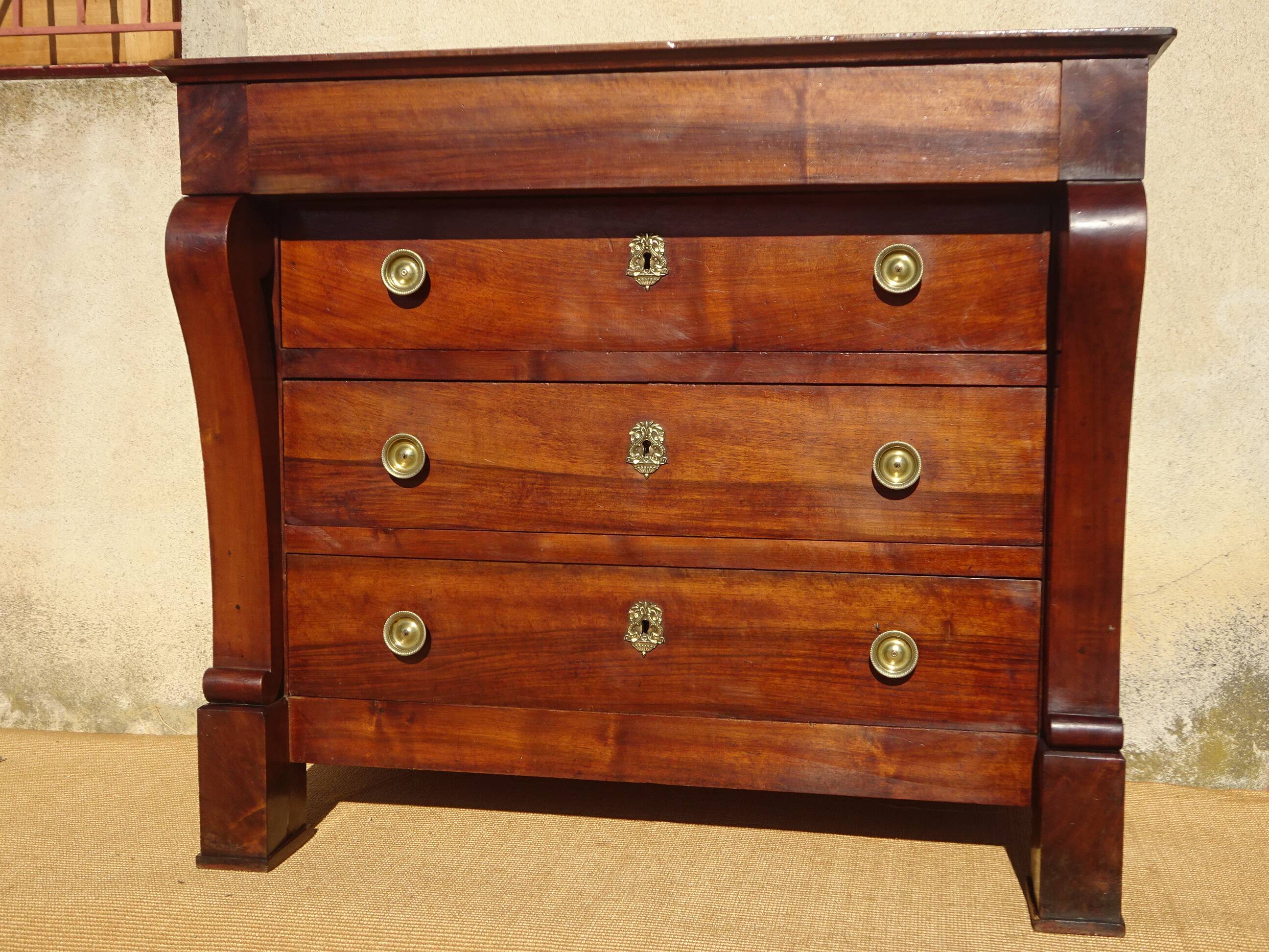 Antique solid walnut chest of drawers with scrolls