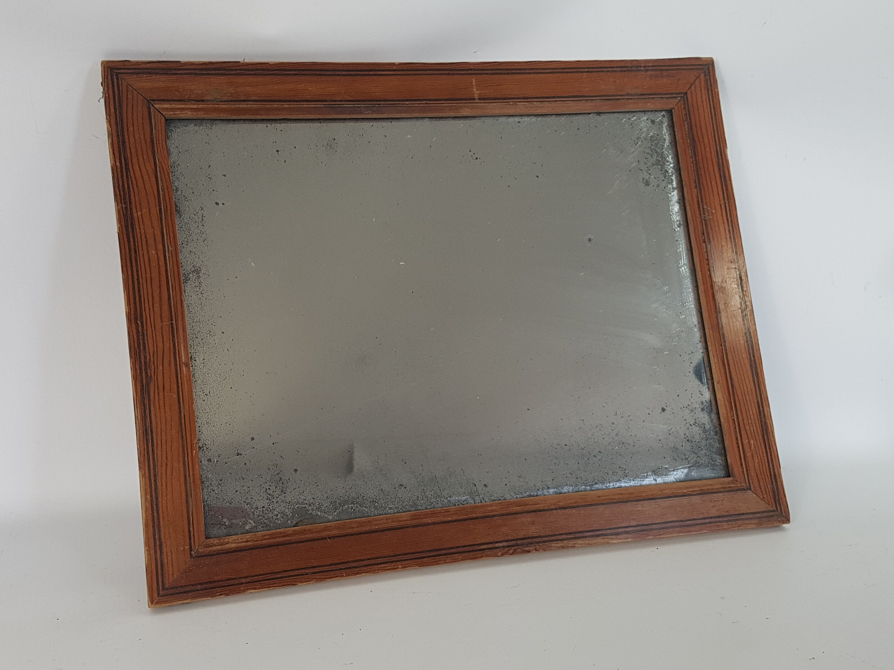 Old mirror in a netwood frame, 19th, 42 x 33 cm