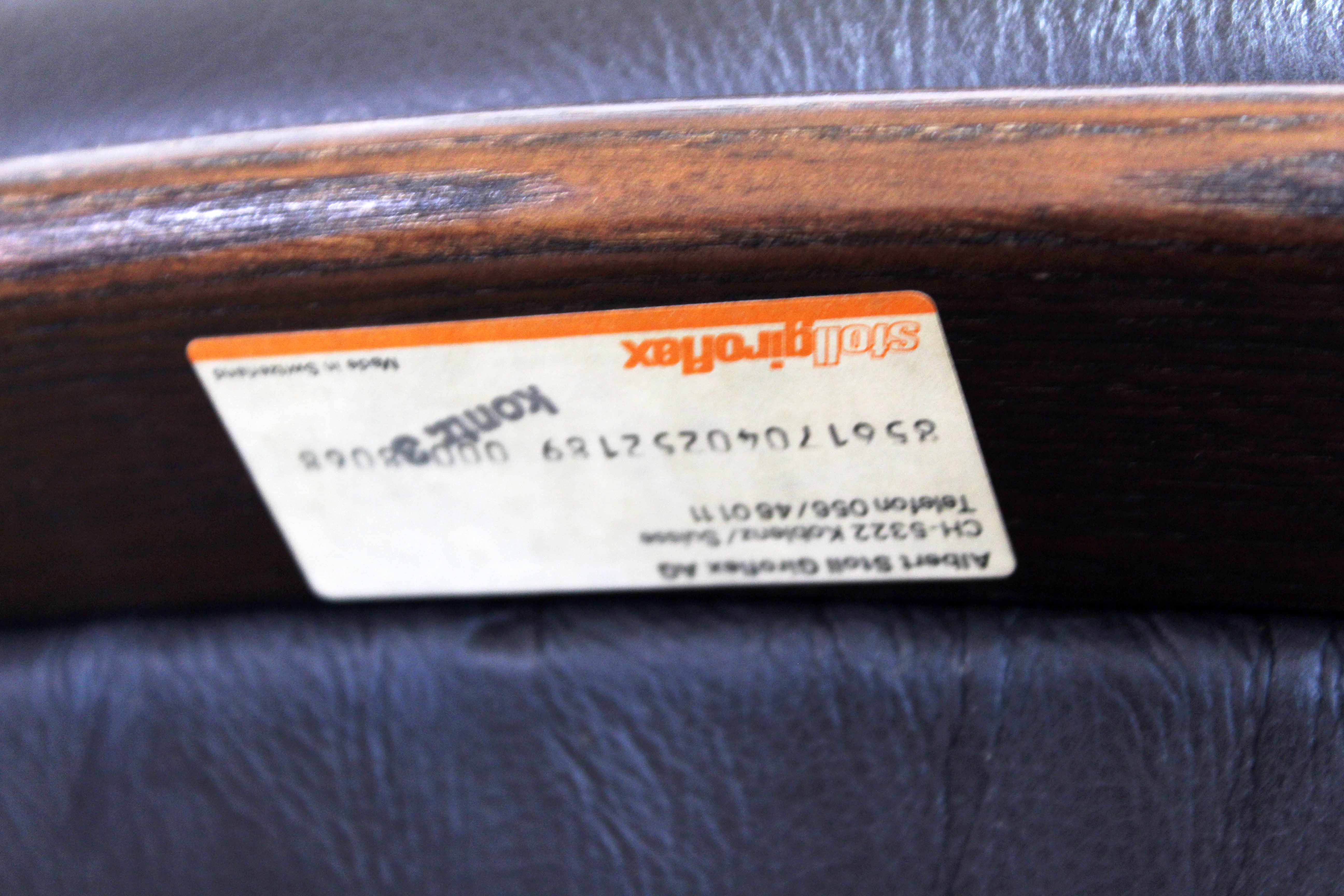Stoll Giroflex conference chair in leather and 1960s wood