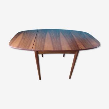 Ovoid rosewood table with 2 extensions. Denmark 1965