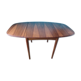 Ovoid rosewood table with 2 extensions. Denmark 1965