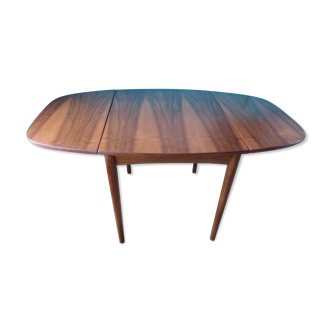 Ovoid rosewood table with 2 extensions. Denmark 1965