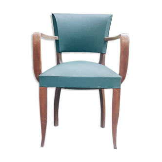 Wooden armchair in green skai