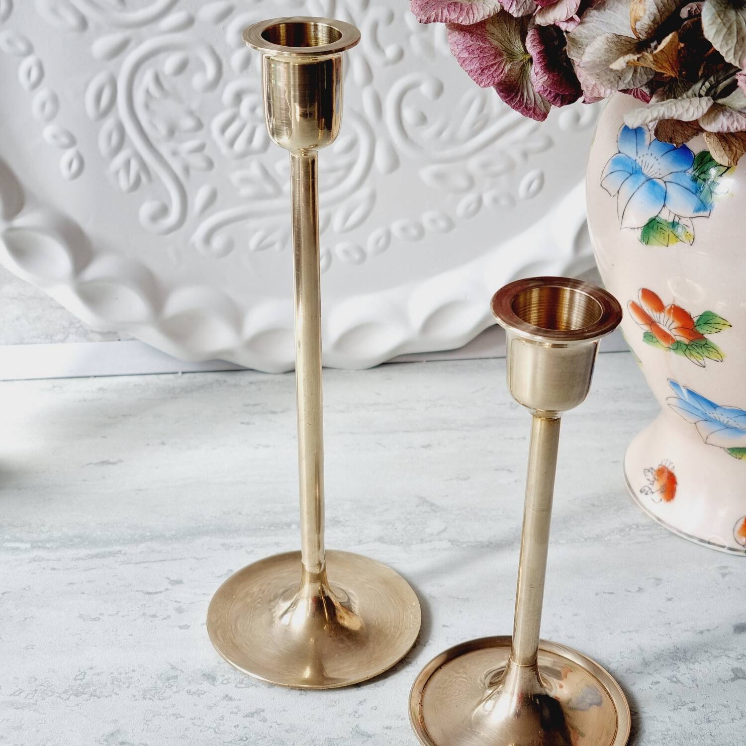 Duo of brass candlesticks