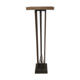 Column 1930 with one foot in wrought iron