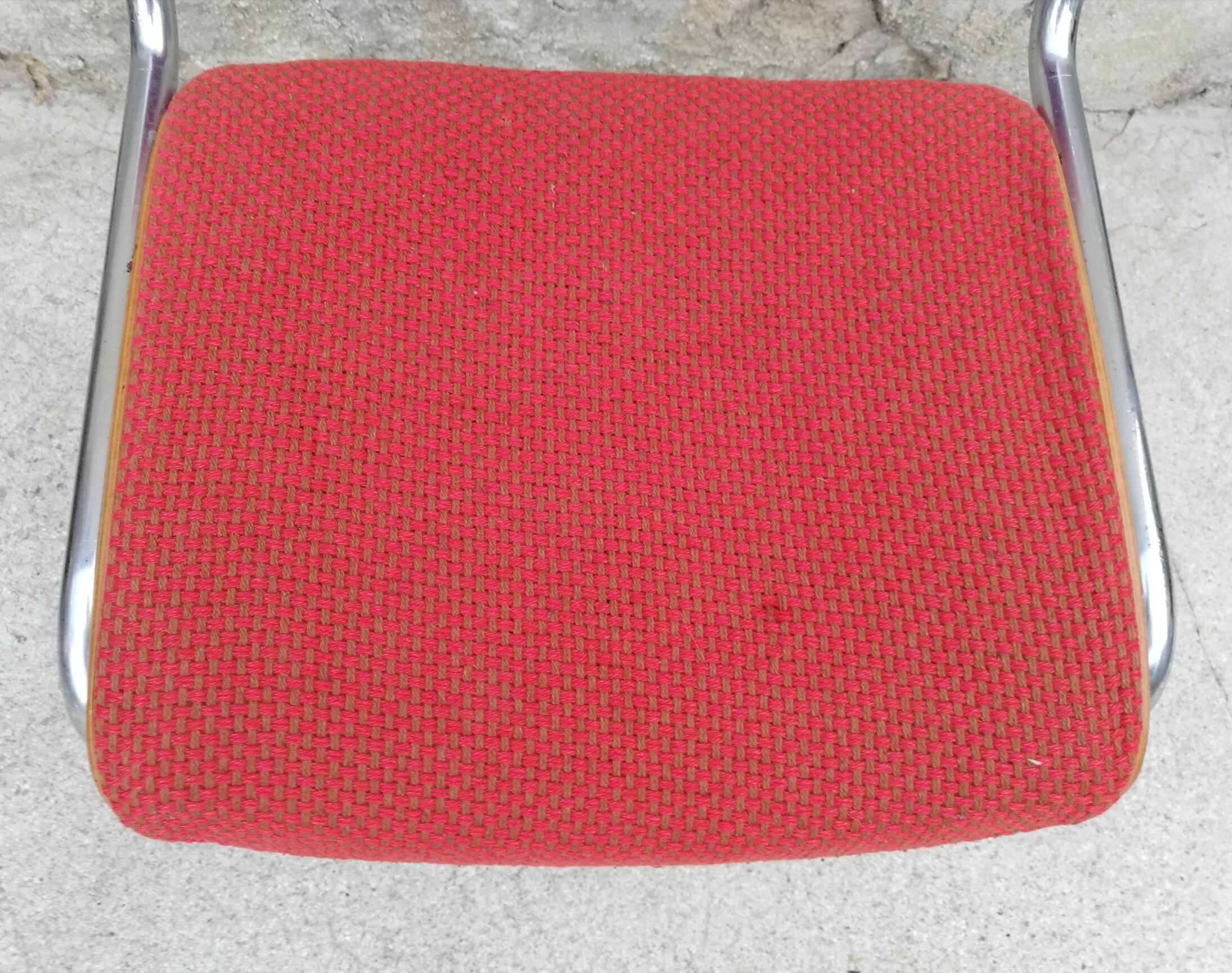 Red chair cantilever chrome tubes