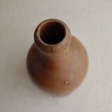 Bouteille ancienne en terre cuite