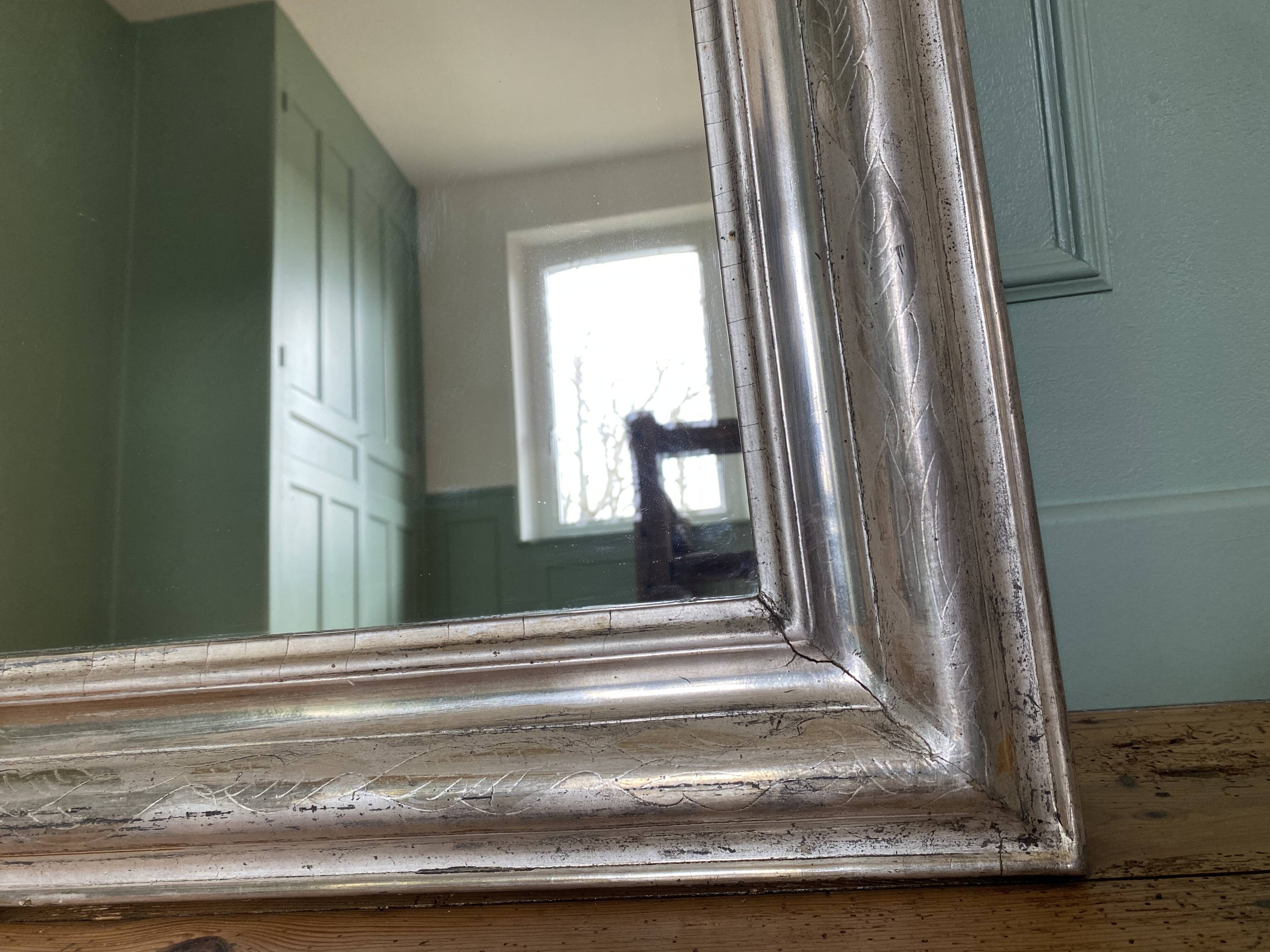 Louis-Philippe mirror gilded with silver leaf
