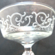 6 Louis XV style champagne glasses engraved with arabesques, baluster foot