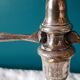Pair of old silver metal candlesticks