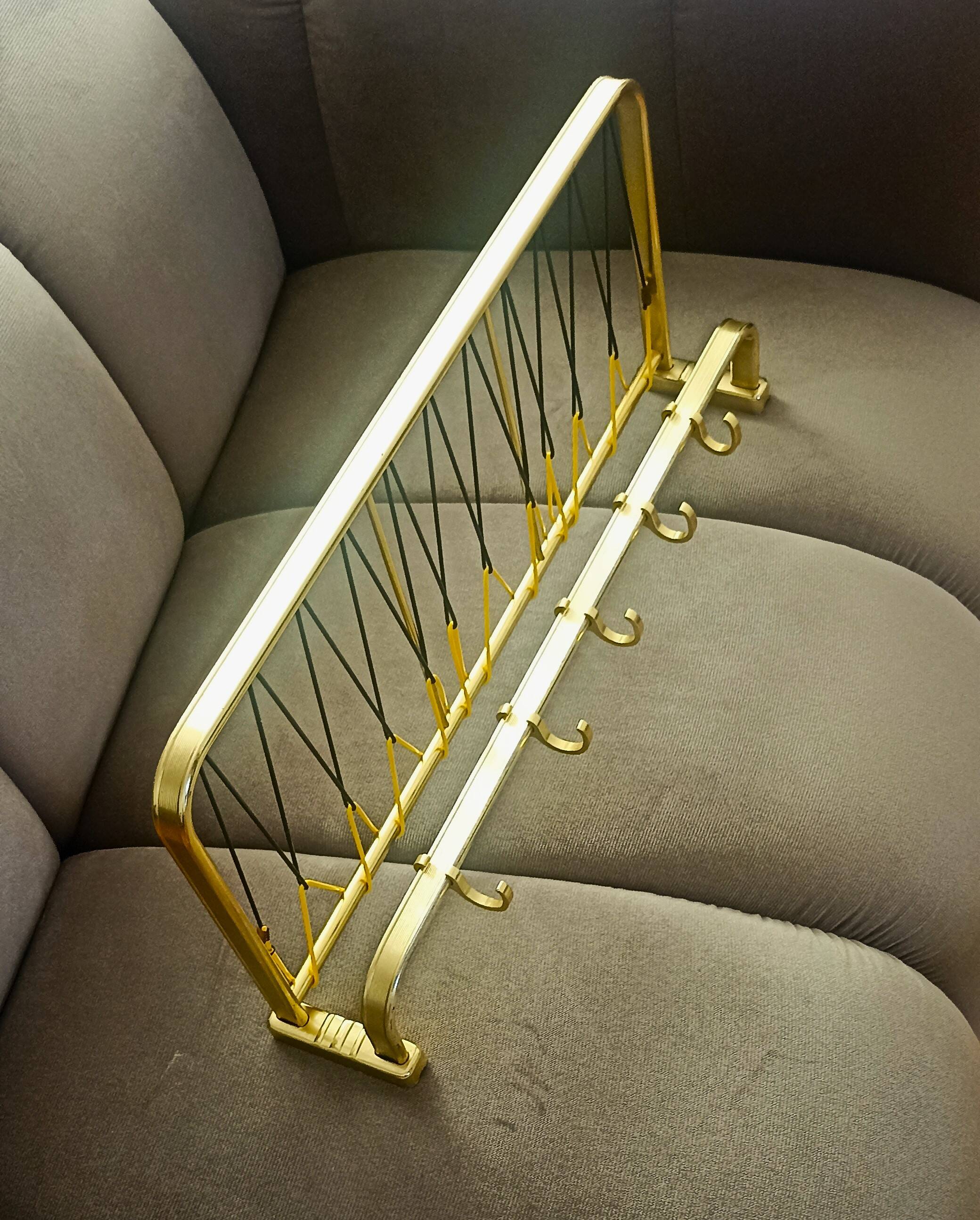 Gold metal wall coat rack