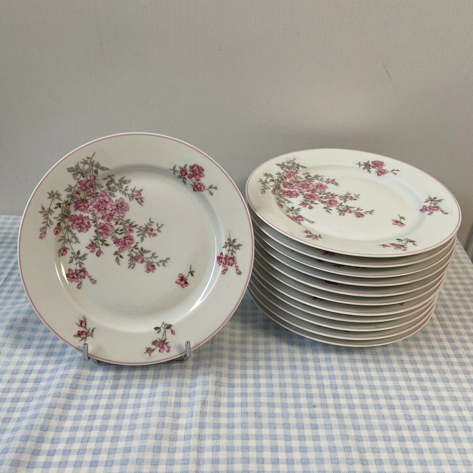 Series of 12 porcelain dessert plates decorated with flowers Bernardaud Limoges