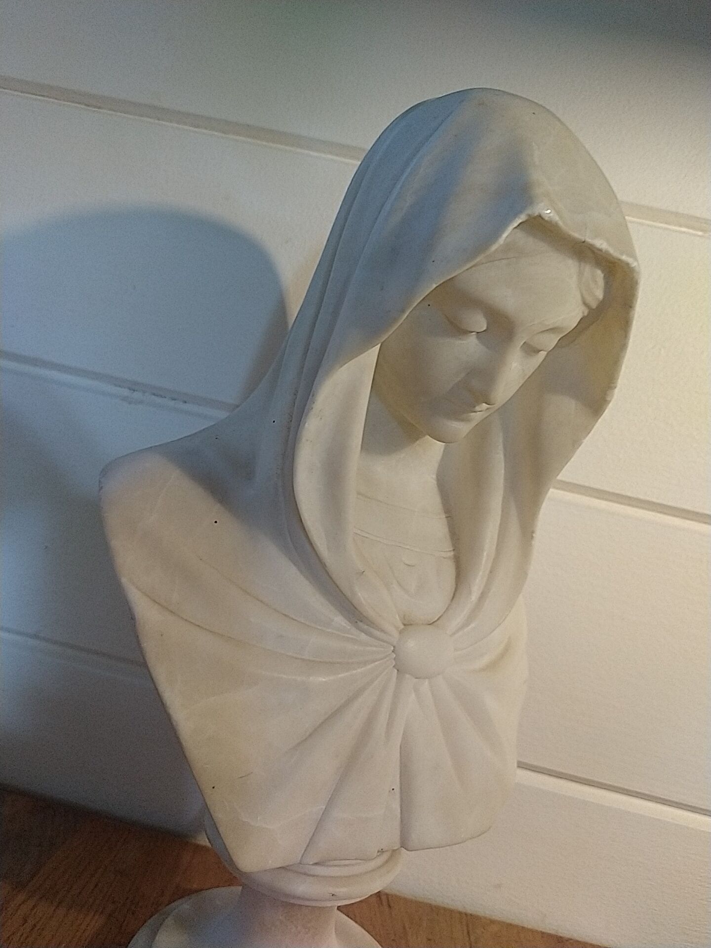 Bust of the Virgin in alabaster by Guglielmo Pugi.