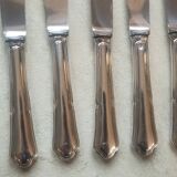 set of 10 silver metal knives
